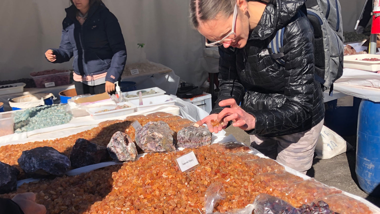 Karin hand-selecting gemstones