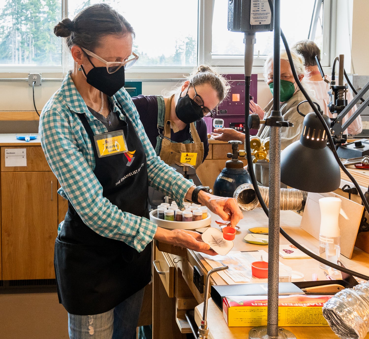 Karin doing an enameling demo