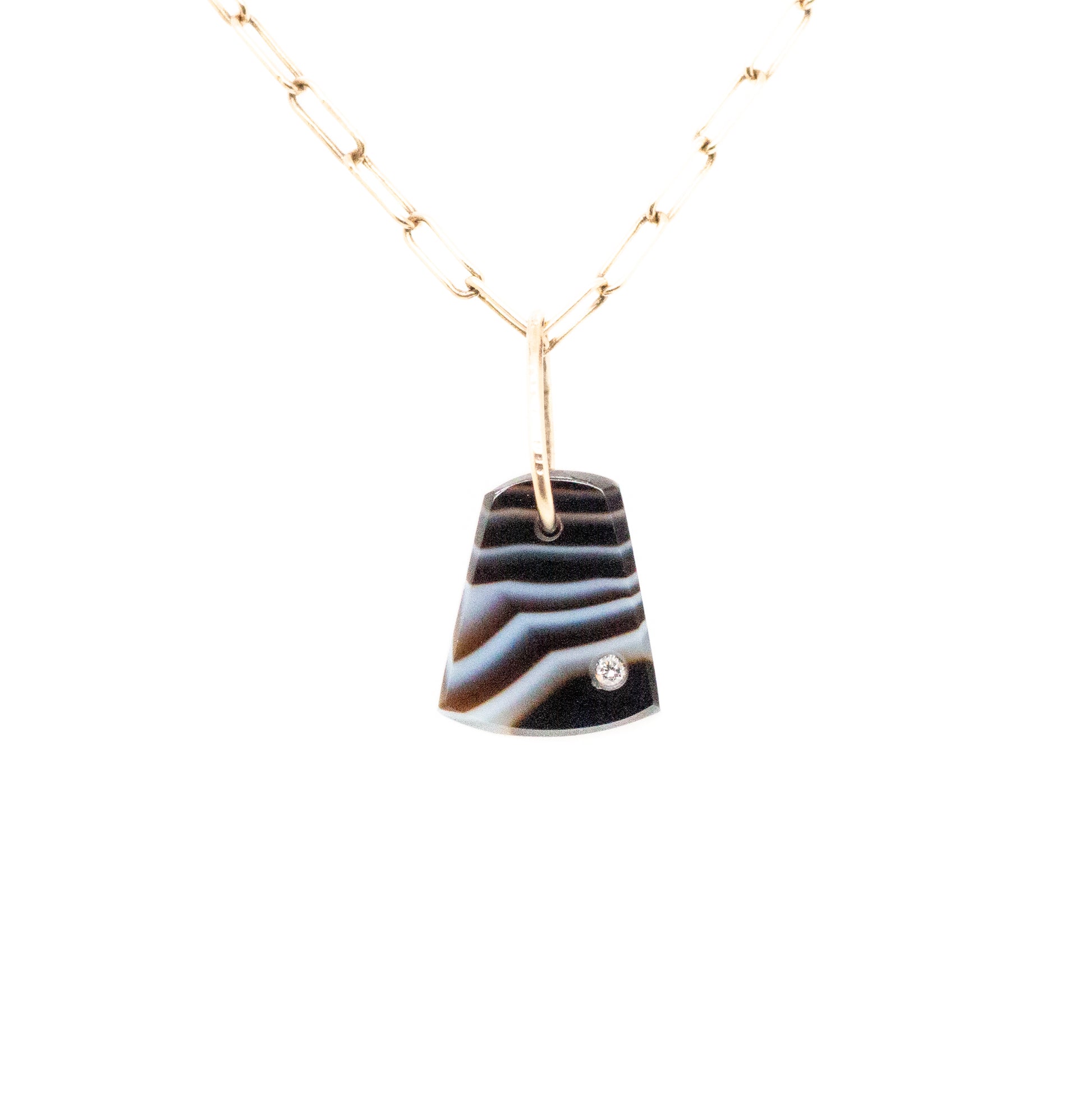 black onyx and diamond gold pebble charm