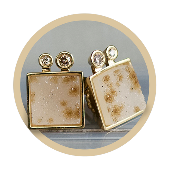 Earrings in a circle container
