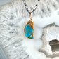 Blue Opalized Wood and Diamond Gold Moon Pendant