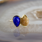 double pear fossilized coral and lapis stone gold ring