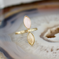 double marquise rose quartz and fossilized coral stone gold ring champagne diamonds